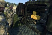 Soldiers handling Embedded Collective Training solution.