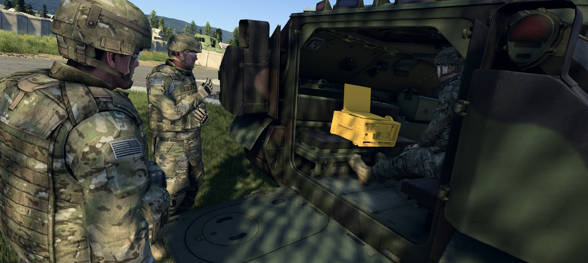 Soldiers handling Embedded Collective Training solution.