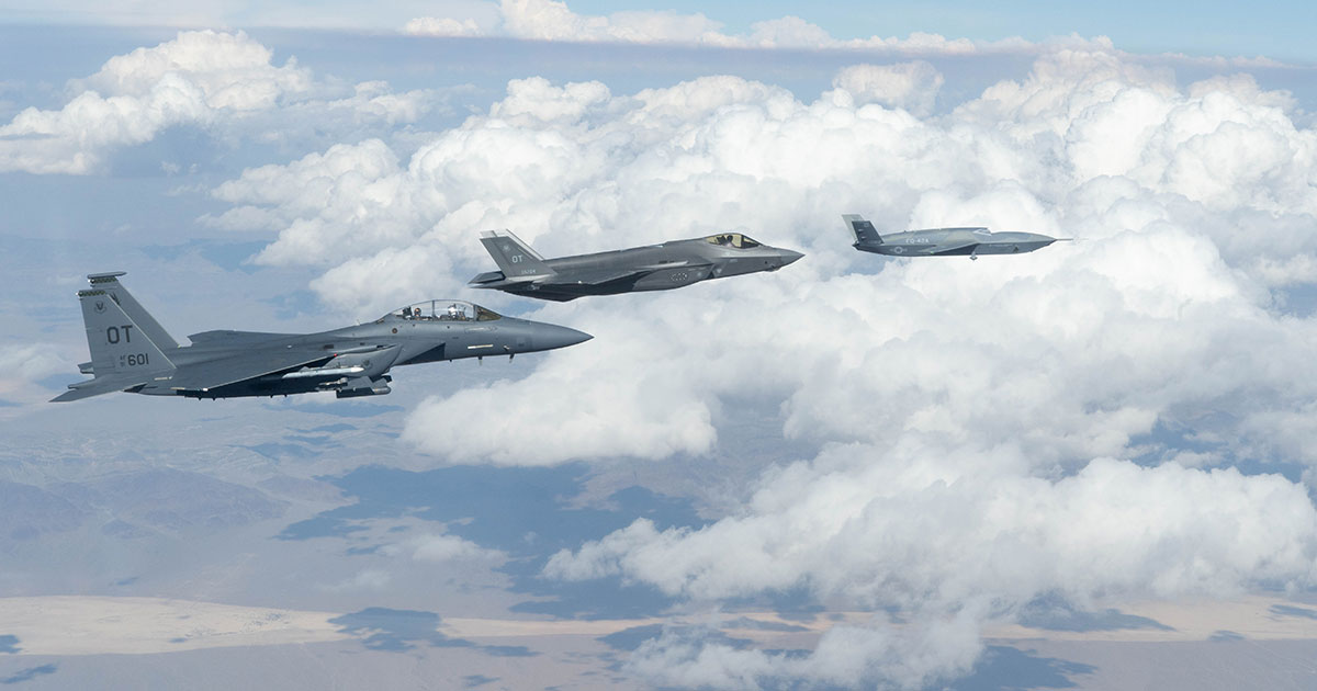 FQ-42 Vengeance unmanned aerial system flying alongside fighter jets. Photo: General Atomics Aeronautical Systems, Inc.