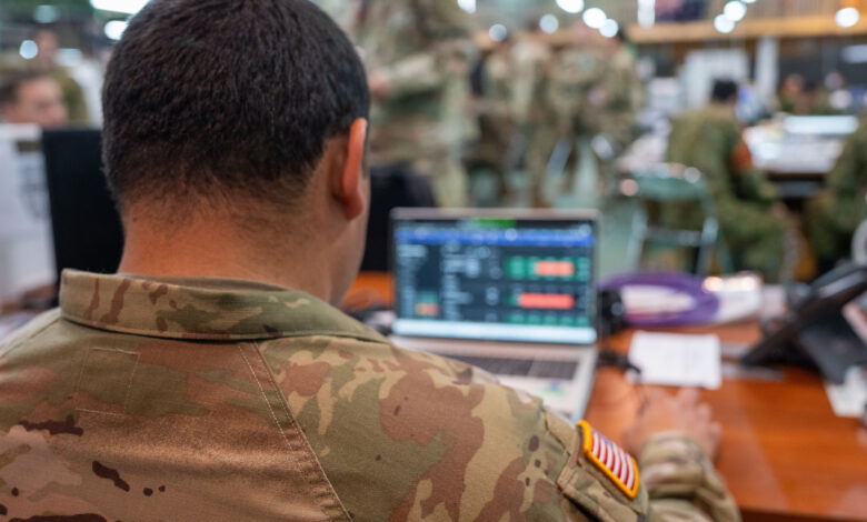 A US Army 11th Airborne Division soldier uses a computer during an exercise. Photo: Correy Mathews/US Army 11th Airborne Division