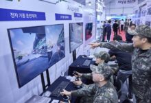 South Korean soldiers interact with battlefield simulation technology showcased by SK Telecom. Photo: SK Telecom