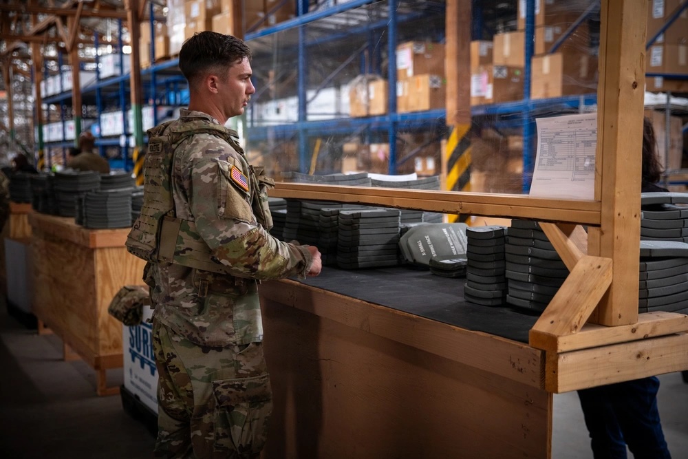A US Army soldier draws equipment from a Central Issue Facility during a deployment readiness exercise at Fort Bliss, Texas, on July 21, 2024. Photo: Staff Sgt. Amasis Obsidian/US Army