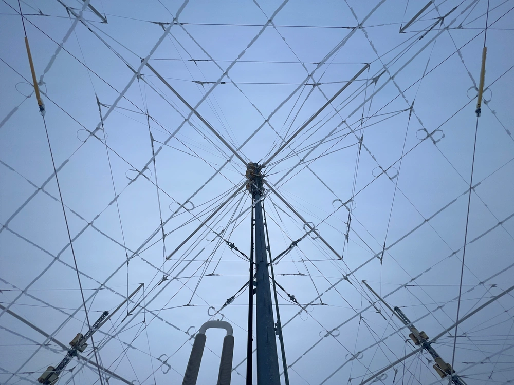 A close-up view shows the crossed-dipole antenna elements of the High Frequency Active Auroral Research Program transmitter array in Gakona, Alaska.
