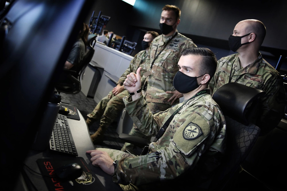 US Cyber Command personnel work at computer workstations during cyber operations at Fort George G. Meade, Maryland, in 2020. Photo: Josef Cole/DVIDS