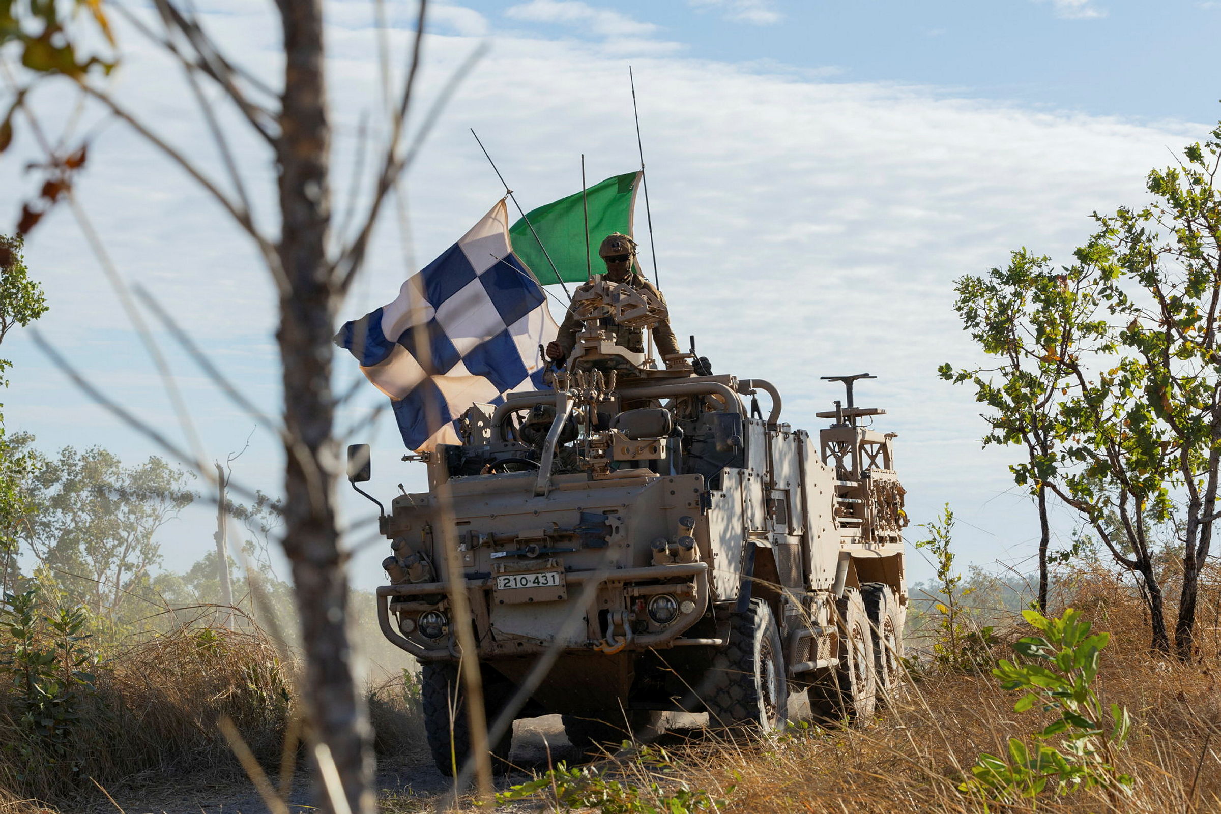 Australian Army soldiers from the 5th Battalion, The Royal Australian Regiment relocate from the observation post in the High Mobility Transporter Supacat during the Battle of Mt Bundey on Exercise Predator's Walk 2024 at the Mount Bundey Training Area, NT. Soldiers from the 1st Brigade conducted the culminating activity for Exercise Predator’s Walk at Mount Bundey Training Area. Over a two-day period, personnel conducted combat team assaults and combined arms live fire exercise known as the Battle of Mount Bundey. read less