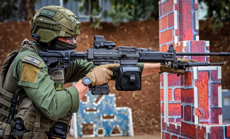 Soldier aiming a rifle equipped with the Arbel counter-unmanned aerial system attachment. Photo: Israel Weapon Industries