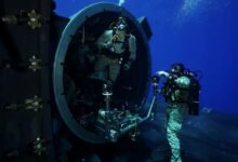 MEDITERRANEAN SEA (July 27, 2024) U.S. Marines from the 2nd Force Reconnaissance Company, assigned to Task Force 61/2, conduct dive training out of the dry deck shelter of Ohio-class guided-missile submarine USS Georgia (SSGN 729) while underway in the Mediterranean Sea July 27, 2024. Headquartered in Naples, Italy, U.S. Naval Forces Europe-Africa (NAVEUR-NAVAF) operates U.S. naval forces in the U.S. European Command and U.S. Africa Command areas of responsibility. U.S. Sixth Fleet is permanently assigned to NAVEUR-NAVAF, and employs maritime forces through the full spectrum of joint and naval operations. (U.S. Navy Courtesy Photo)