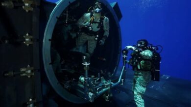 MEDITERRANEAN SEA (July 27, 2024) U.S. Marines from the 2nd Force Reconnaissance Company, assigned to Task Force 61/2, conduct dive training out of the dry deck shelter of Ohio-class guided-missile submarine USS Georgia (SSGN 729) while underway in the Mediterranean Sea July 27, 2024. Headquartered in Naples, Italy, U.S. Naval Forces Europe-Africa (NAVEUR-NAVAF) operates U.S. naval forces in the U.S. European Command and U.S. Africa Command areas of responsibility. U.S. Sixth Fleet is permanently assigned to NAVEUR-NAVAF, and employs maritime forces through the full spectrum of joint and naval operations. (U.S. Navy Courtesy Photo)