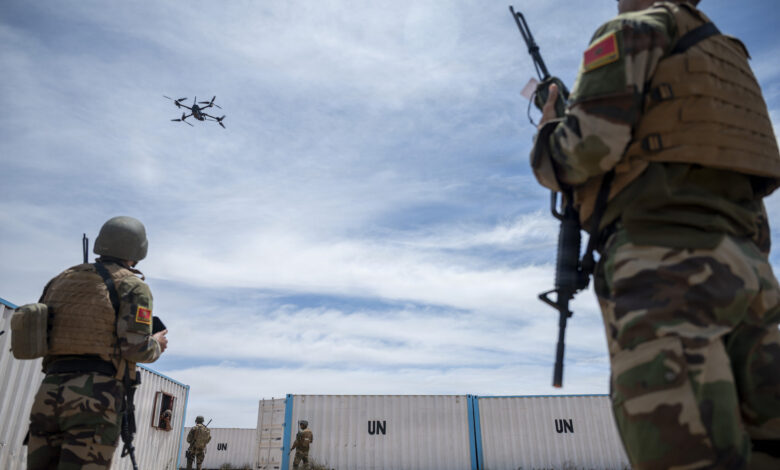 Members of the Moroccan Groupement des Forces Spéciale set up a drone to conduct reconnaissance during a Joint Combined Exchange Training (JCET) at Tifnit Training Base, Morocco, May 13, 2026. JCETs strengthen interoperability and hone crucial skills by integrating U.S. and partner forces in realistic training scenarios. (U.S. Air Force photo by Staff Sgt. Enrique Barcelo)