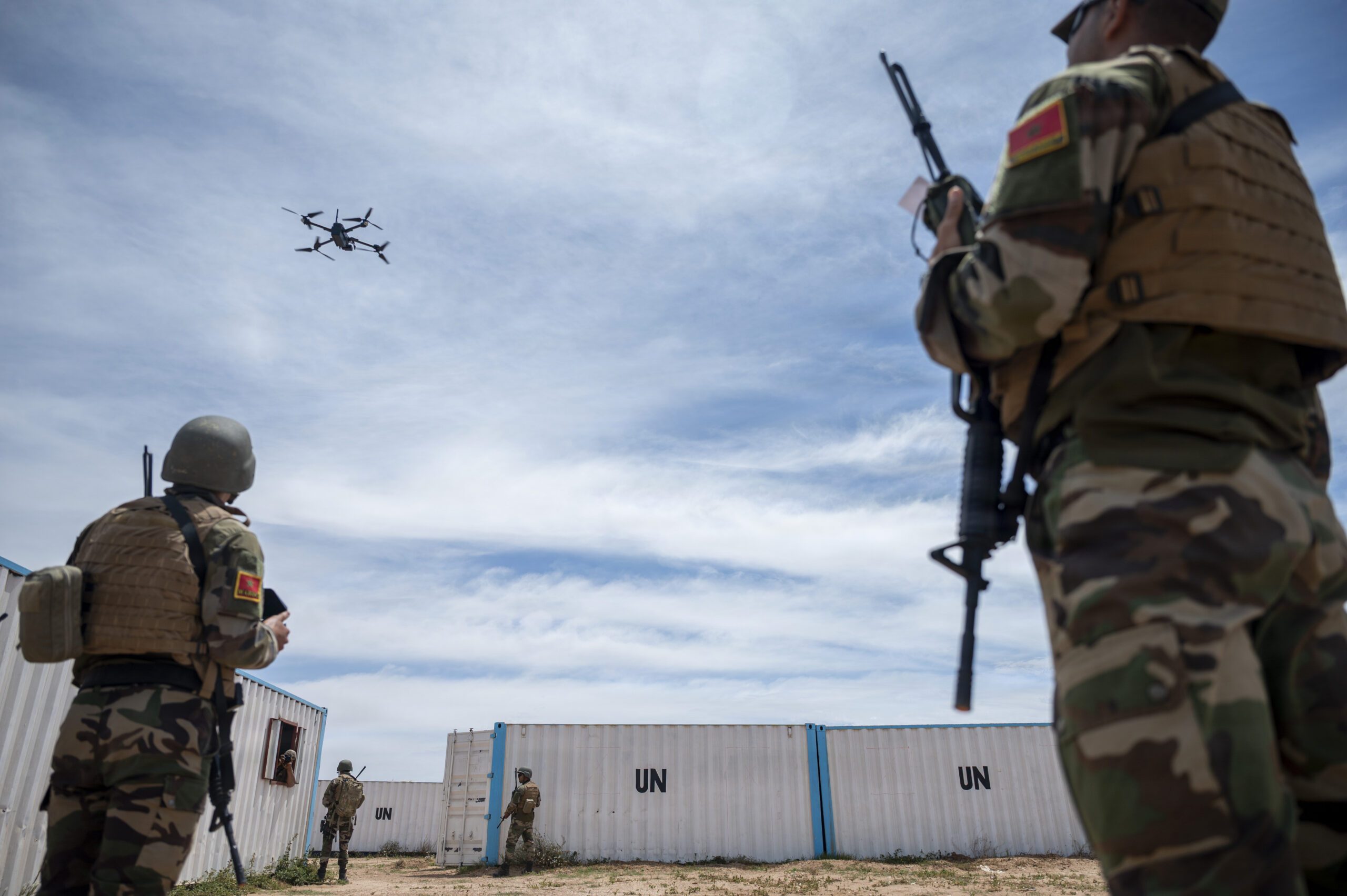 Members of the Moroccan Groupement des Forces Spéciale set up a drone to conduct reconnaissance during a Joint Combined Exchange Training (JCET) at Tifnit Training Base, Morocco, May 13, 2026. JCETs strengthen interoperability and hone crucial skills by integrating U.S. and partner forces in realistic training scenarios. (U.S. Air Force photo by Staff Sgt. Enrique Barcelo)