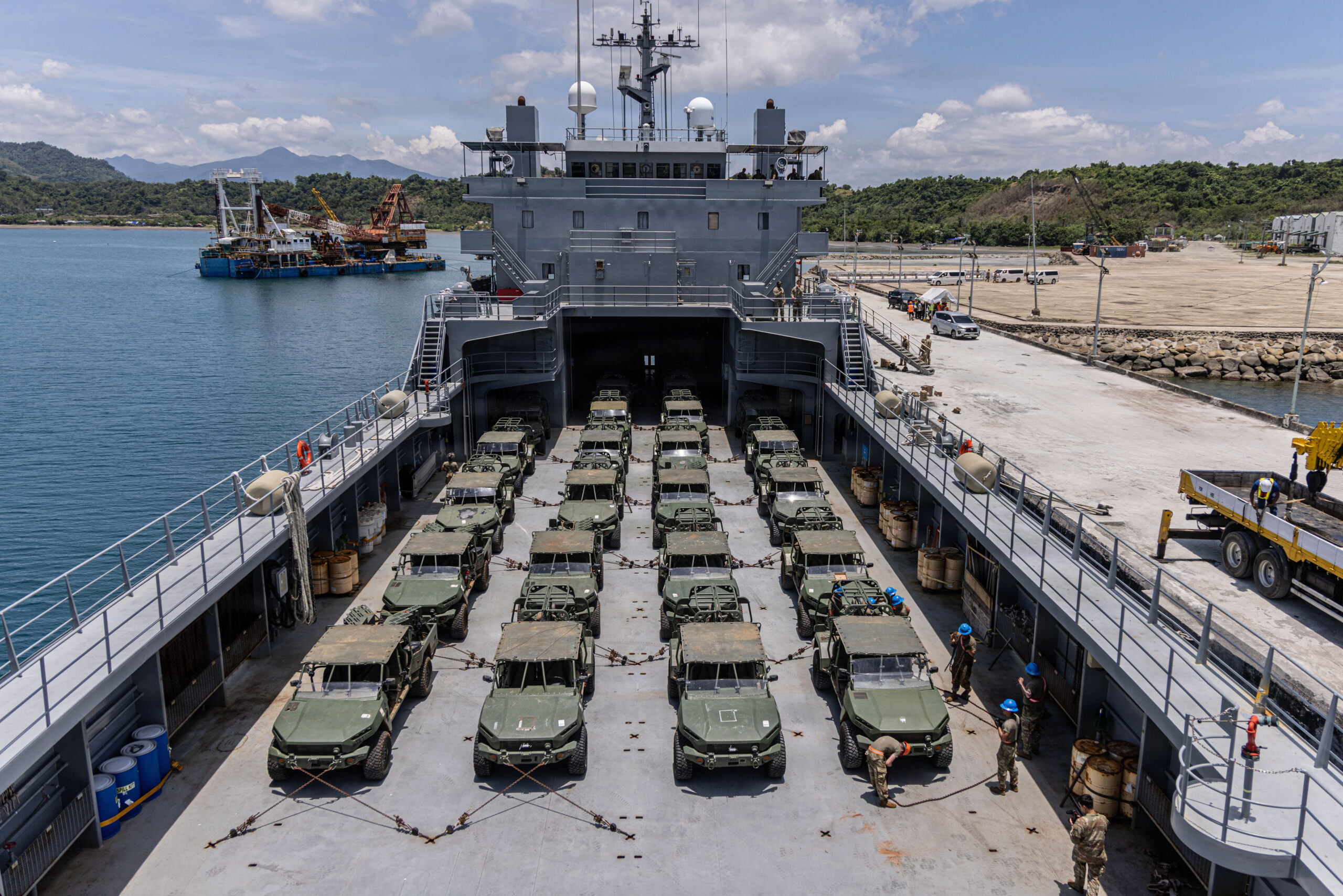 U.S. Soldiers assigned to 2nd Battalion, 27th Infantry Regiment, 25th Infantry Division load Infantry Squad Vehicles onto a Logistics Support Vessel assigned to 168th Transportation Detachment after the completion of Operational Maneuver as part of Salaknib 2026 at Port Irene, Philippines, June 16, 2026. Exercise Salaknib highlights the enduring U.S.-Philippine alliance, enhancing interoperability and readiness through combined arms operations, multi-domain integration, and humanitarian assistance efforts for regional stability. (U.S. Army photo by Sgt. Abreanna Goodrich)