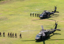 Soldiers from the 26th Royal Malaysian Regiment, 5th Infantry Division board Black Hawk helicopters from the U.S. Army Task Force Nightcard, 2nd Combat Aviation Brigade, 2nd Infantry Division. These Malaysian conducted joint air assault training with Australian Army 162 Recce Squadron, 1st Aviation Regiment, during exercise Keris Strike 2026, in Kota Belud, Malaysia, July 24, 2026. Keris Strike is a long-standing and evolving military exercise designed to enhance interoperability and strengthen security partnerships among American, Australian and Malaysian military forces across the Indo-Pacific region. (U.S. Army photo by Spc. Wesley Richardson)