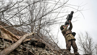 A Ukrainian soldier uses an anti-drone rifle in the Zaporizhzhia direction.