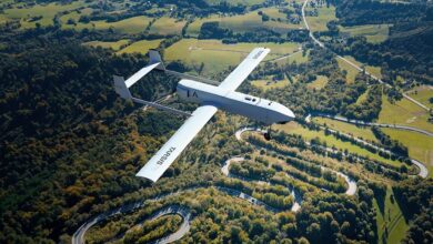 Indra’s TARSIS unmanned aerial system in flight over mountainous terrain. Photo: Indra