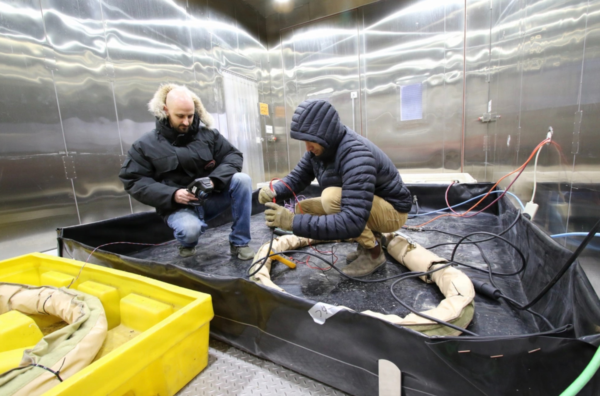 Dr. Dan Tague (left) and James Pilkington conduct cold-hardening testing inside the Cold Regions Research and Engineering Laboratory’s Extreme Cold Chamber in Hanover, N.H.